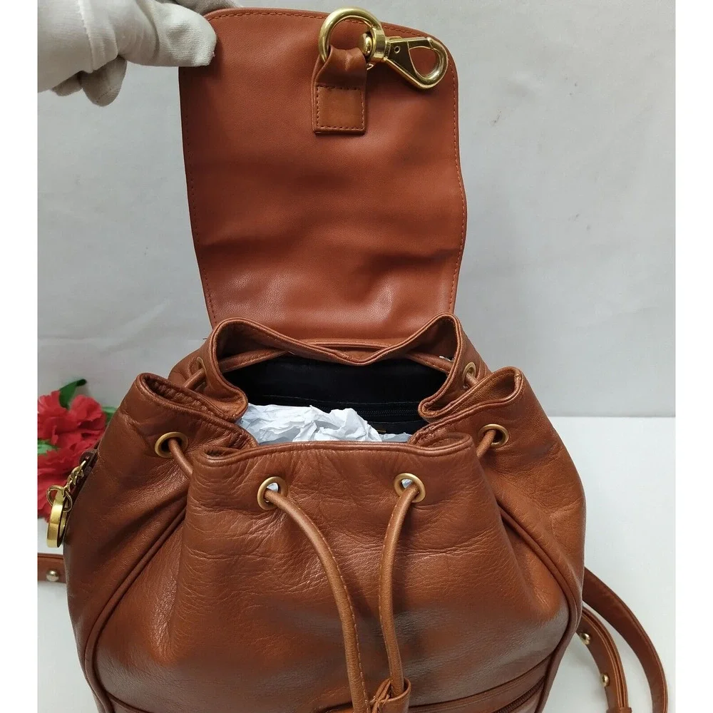 Perlina Brown Leather Zipper Pockets Flap Top Handle Drawstring Backpack